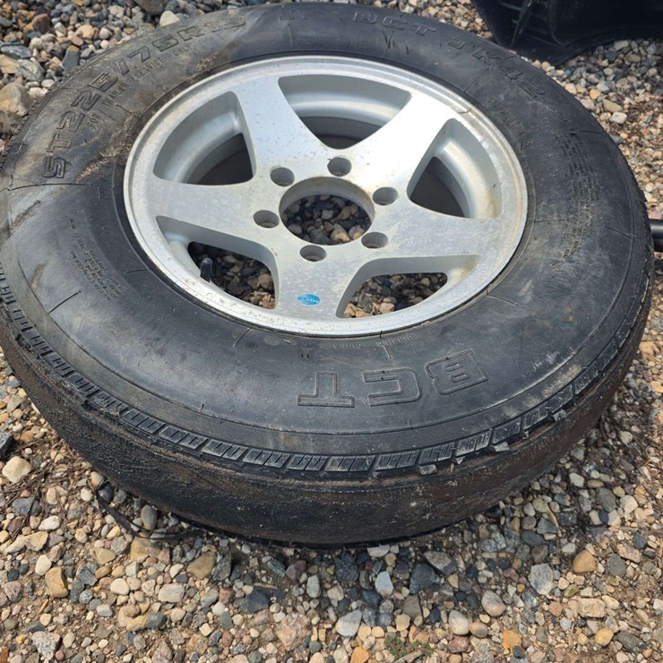 15” Tire on 6 Bolt Rim, off a Ice Castle Fish House, *Needs a New Tire