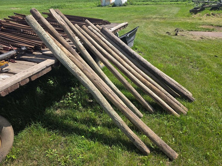 (11)-4”-wood-round-posts,-mostly-6’6”-long,-buying-all-for-one-money-image-1