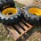 4-brand-new-265/70-16.5-skidloader-tires-&-rims-image-3