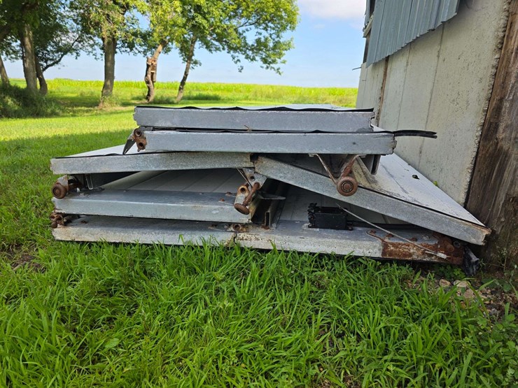 insulated-garage-door,-16’-wide-x-14’-tall,-has-some-damage,-see-photos-image-7