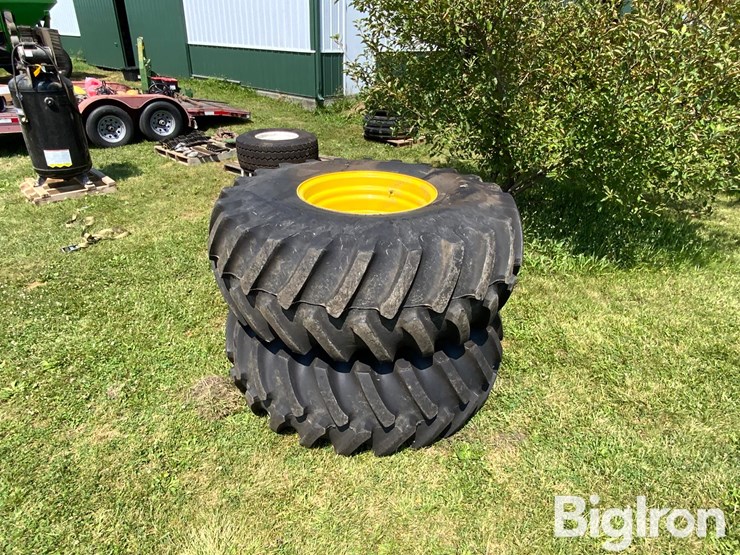 firestone-23.1-26-tires-on-8-bolt-john-deere-rims-image-1