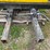 300-gallon-poly-tank-with-front-mount-saddle-with-brackets,-came-off-ih-7130-tractor-image-8