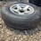 15”-tire-on-6-bolt-rim,-off-a-ice-castle-fish-house,-*needs-a-new-tire-image-2