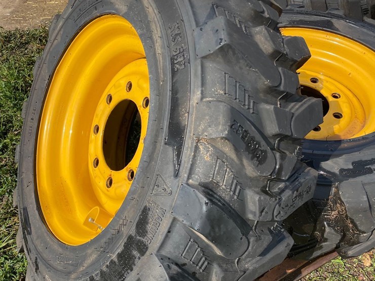 4-brand-new-265/70-16.5-skidloader-tires-&-rims-image-4