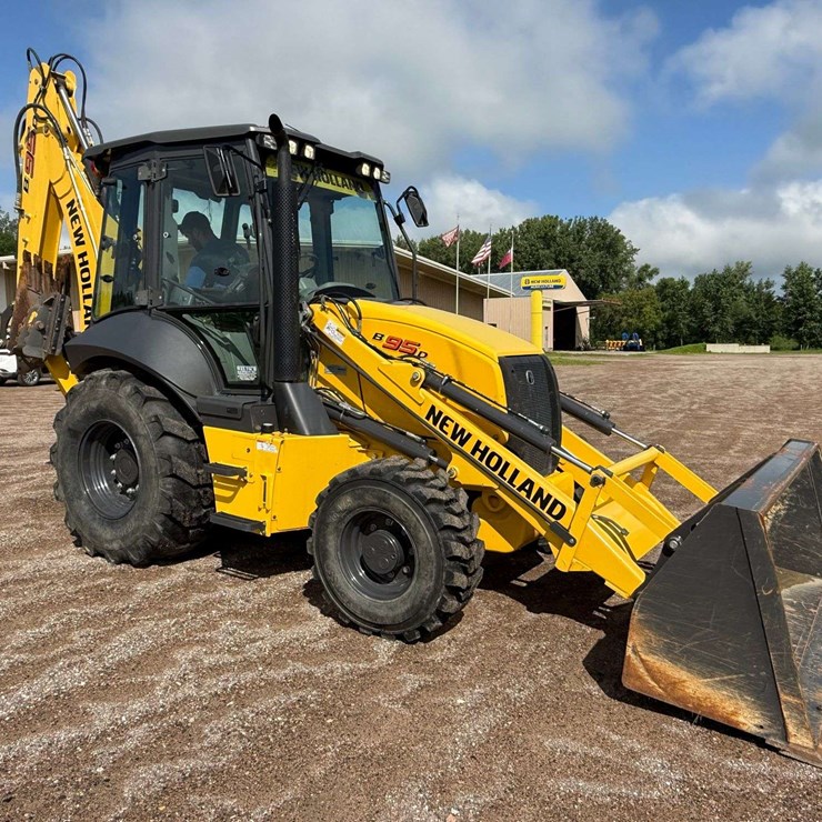 New Holland B95D Backhoe, FWA, 88” Front Bucket, 378 Hours, Extended Hoe, 17” Back Bucket, Out Rigge