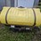 300-gallon-poly-tank-with-front-mount-saddle-with-brackets,-came-off-ih-7130-tractor-image-2