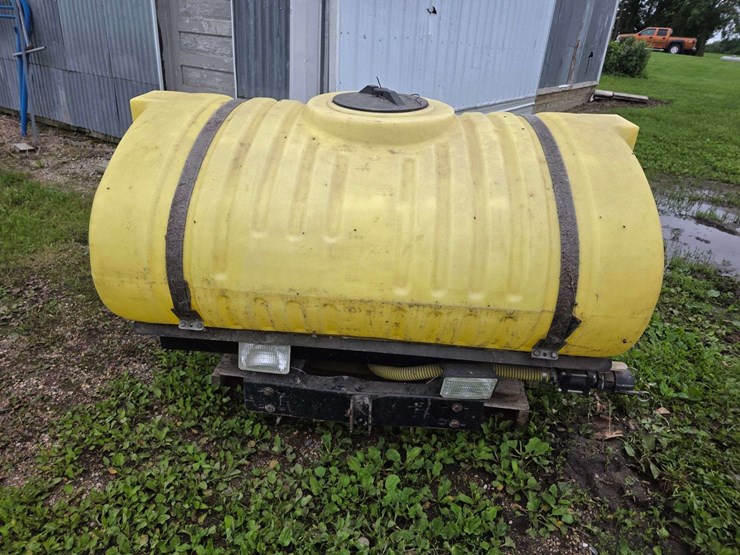 300-gallon-poly-tank-with-front-mount-saddle-with-brackets,-came-off-ih-7130-tractor-image-2