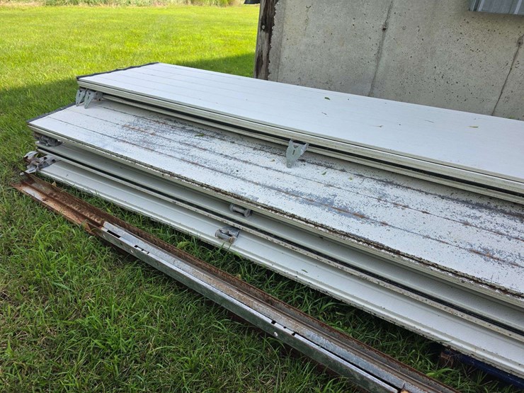 insulated-garage-door,-16’-wide-x-14’-tall,-has-some-damage,-see-photos-image-4