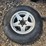 15”-tire-on-6-bolt-rim,-off-a-ice-castle-fish-house,-*needs-a-new-tire-image-3