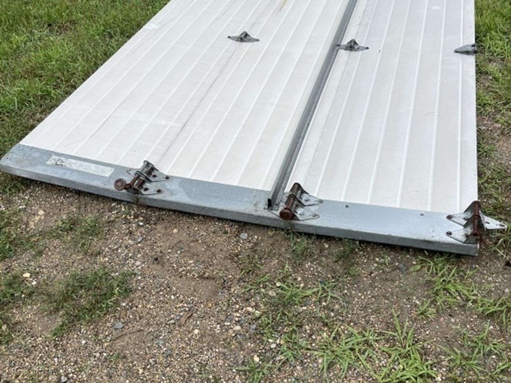 insulated-garage-door,-16’-wide-x-14’-tall,-has-some-damage,-see-photos-image-13