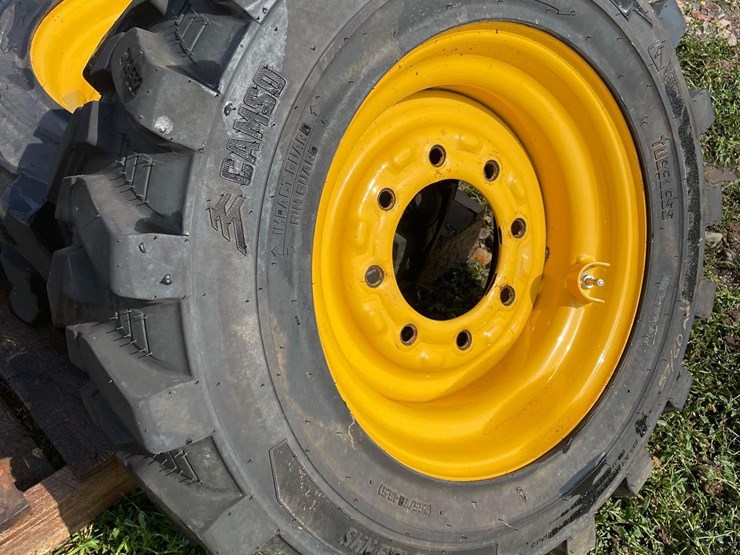 4-brand-new-265/70-16.5-skidloader-tires-&-rims-image-5