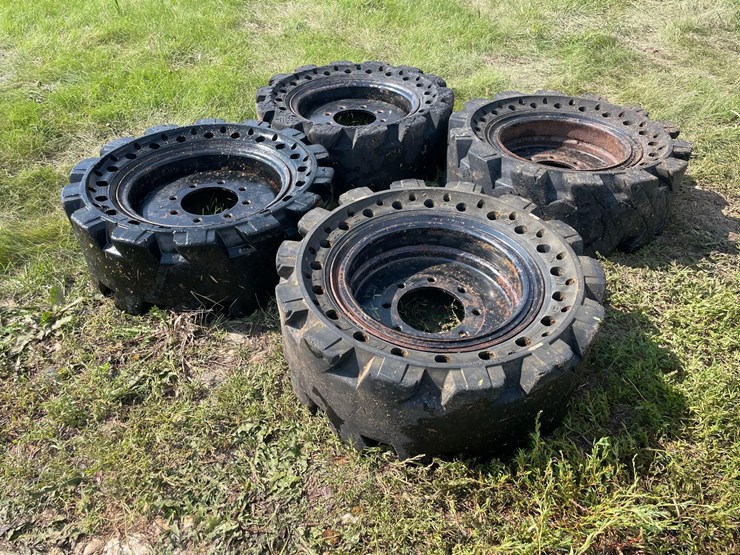 4-solid-rubber-used-skidloader-tires-image-1