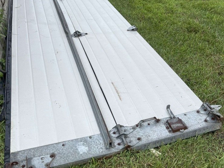 insulated-garage-door,-16’-wide-x-14’-tall,-has-some-damage,-see-photos-image-11