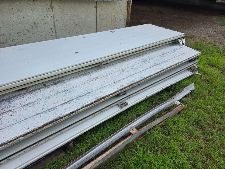 insulated-garage-door,-16’-wide-x-14’-tall,-has-some-damage,-see-photos-image-5