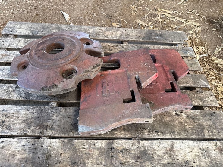 2-ih-stamped-suitcase-weights-and-a-wheel-weight-image-1