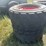 #3690-•-(2)-used-bobcat-tires-on-8-bolt-rims-image-1