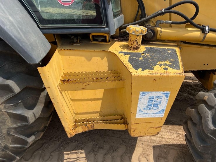 2004-deere-310sg-image-26