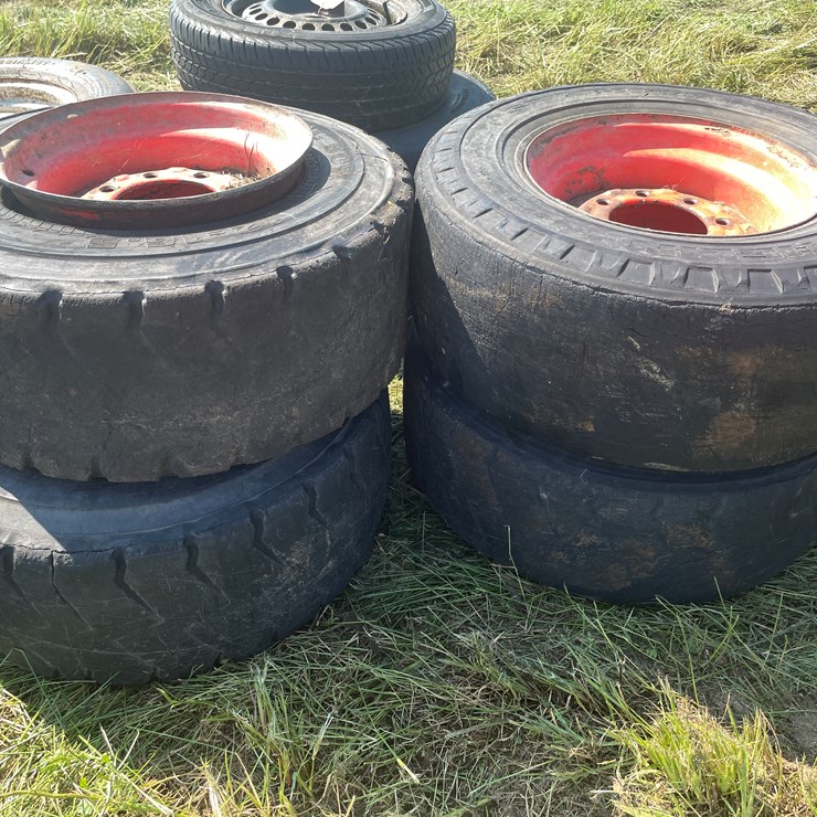 #3691 • (4) Used Skid Steer Tires on 8-Bolt Rims
