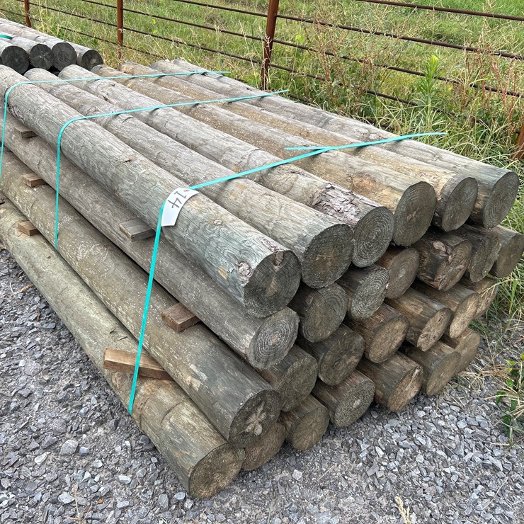 #14 • BUNDLE OF (28) 6”X7’ TREATED POSTS