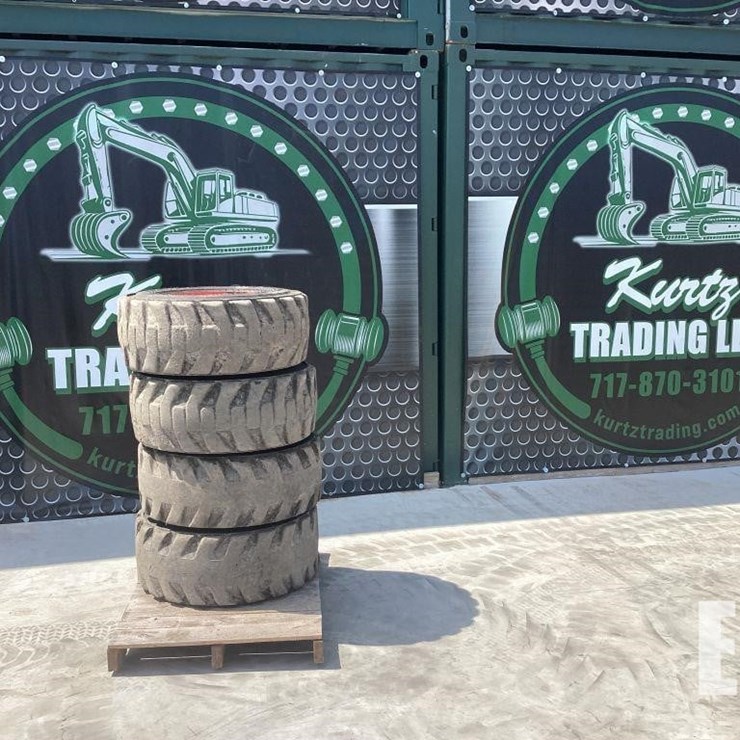 12-16.5 BOBCAT TIRES ON BOBCAT WHEELS