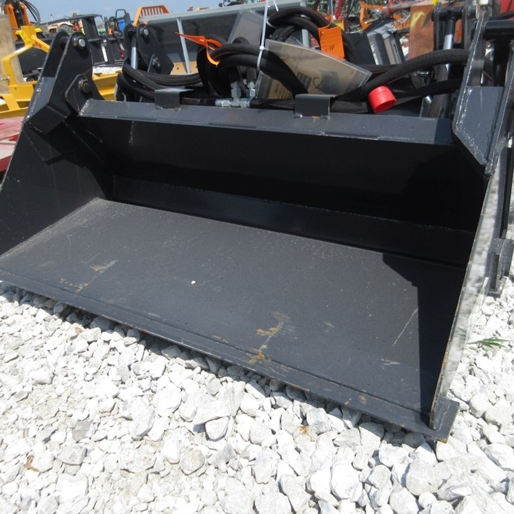 Wolverine Mini Skid Steer Combination Bucket