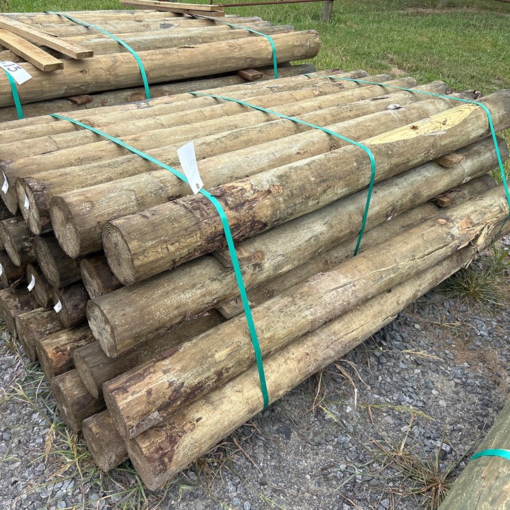 #12 • BUNDLE OF (28) 6”X7’ TREATED POSTS