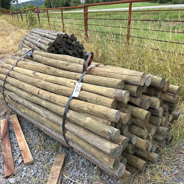#26 • BUNDLE OF (100) 3”X7’ TREATED POSTS