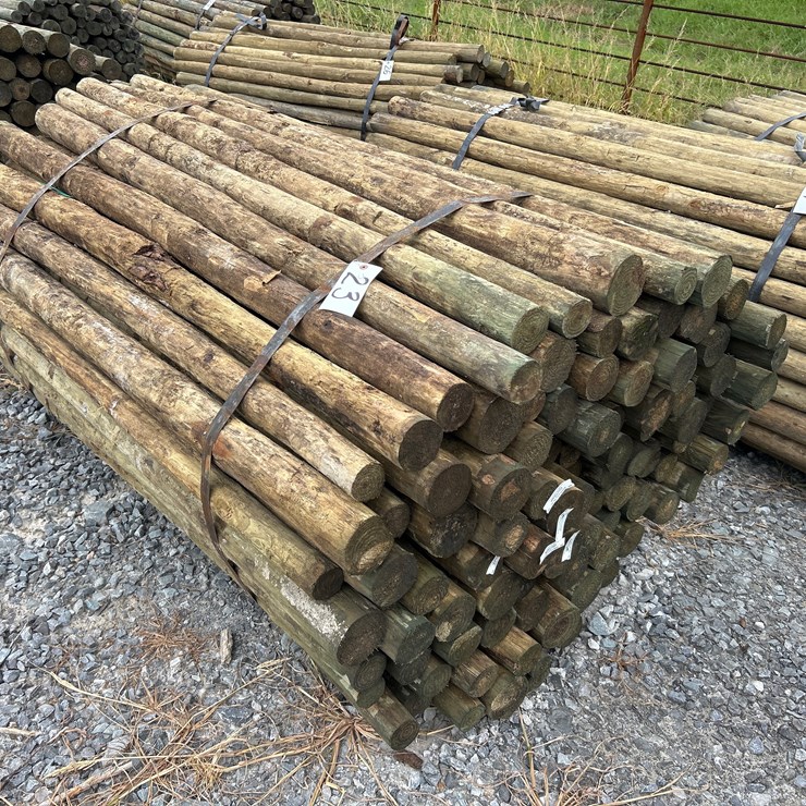 #23 • BUNDLE OF (100) 3”X7’ TREATED POSTS