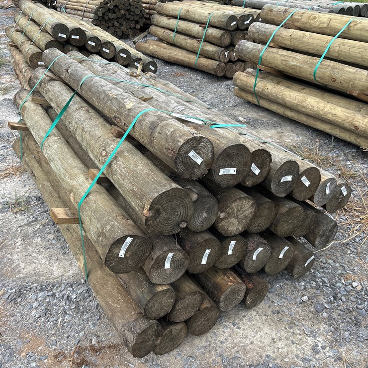 #16 • BUNDLE OF (28) 6”X7’ TREATED POSTS