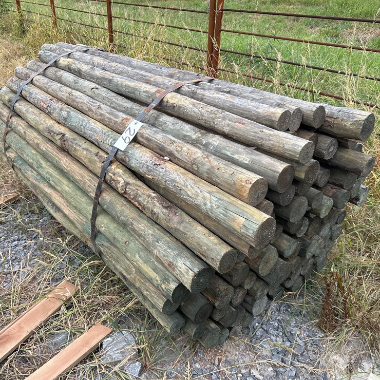 #29 • BUNDLE OF (100) 3”X7’ TREATED POSTS