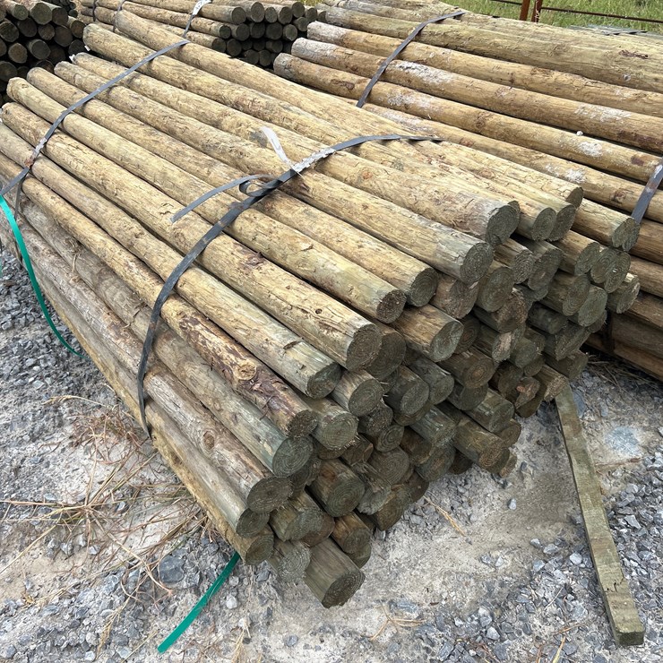 #22 • BUNDLE OF (100) 3”X7’ TREATED POSTS