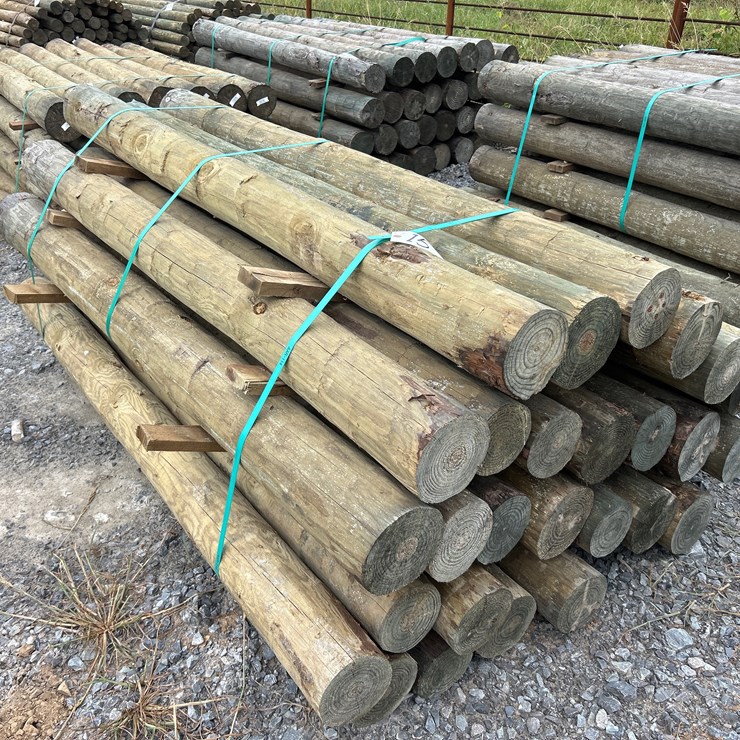 #15 • BUNDLE OF (28) 6”X7’ TREATED POSTS