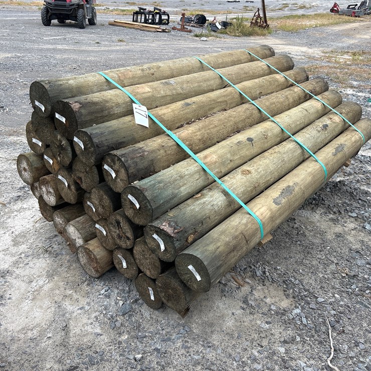 #17 • BUNDLE OF (28) 6”X7’ TREATED POSTS