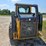 2010-deere-320d-image-9