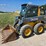 2010-deere-320d-image-2