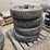 #79735-•-qty-4,-9.00r20,-10-lug-tires-and-rims-image-1