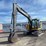 2015-deere-135g-image-1