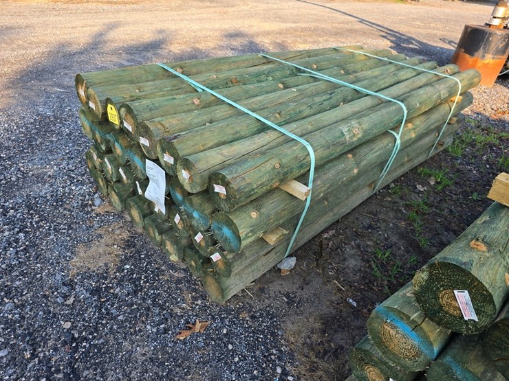 new-32-4-5/8x7-treated-fence-posts-image-1