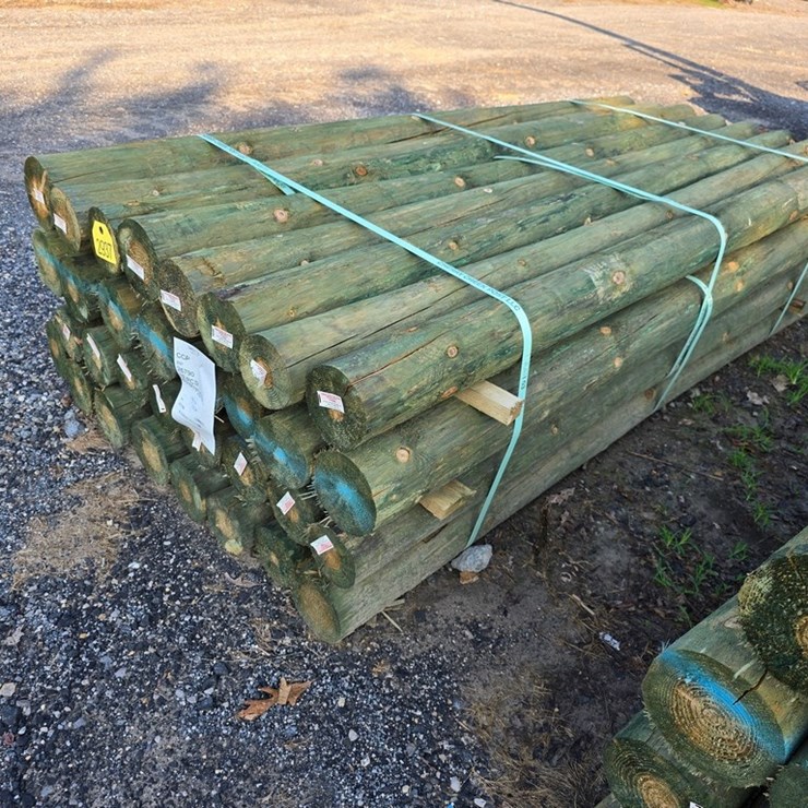 New 32-4 5/8x7 Treated Fence Posts