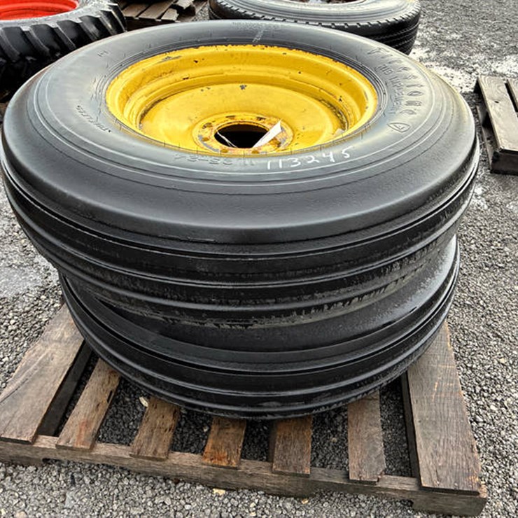 #113245 • 11.25-24 TIRES ON JD RIMS