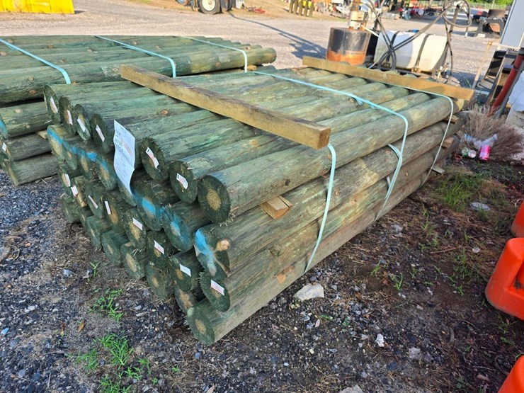 new-32-4-5/8x7-treated-fence-posts-image-1