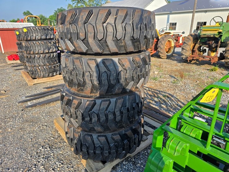 new-4-12-16.5-forerunner-skidloader-tires-&-rims-image-1
