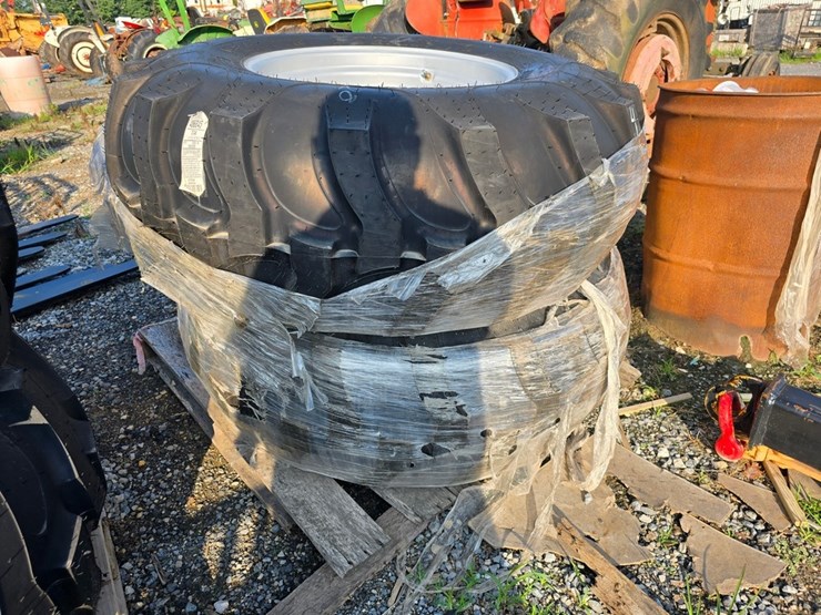 new-2-16.9-24-tractor-tires-&-rims-image-1