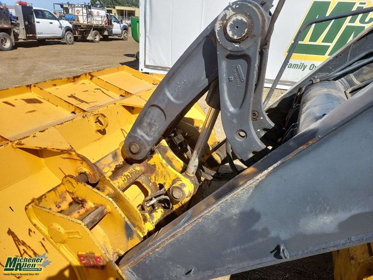 2011-deere-710j-image-36