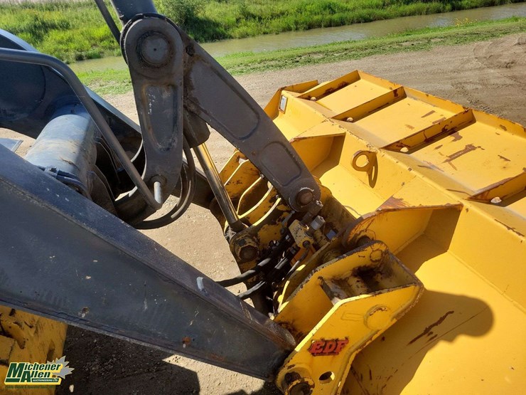 2011-deere-710j-image-35