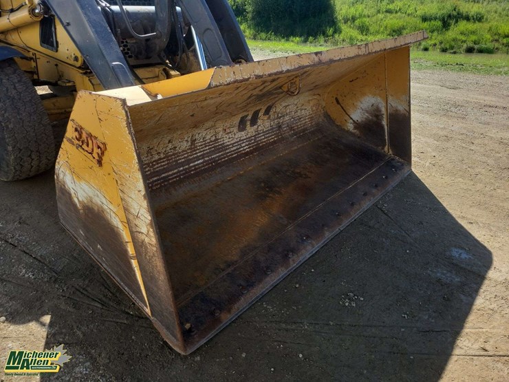 2011-deere-710j-image-34