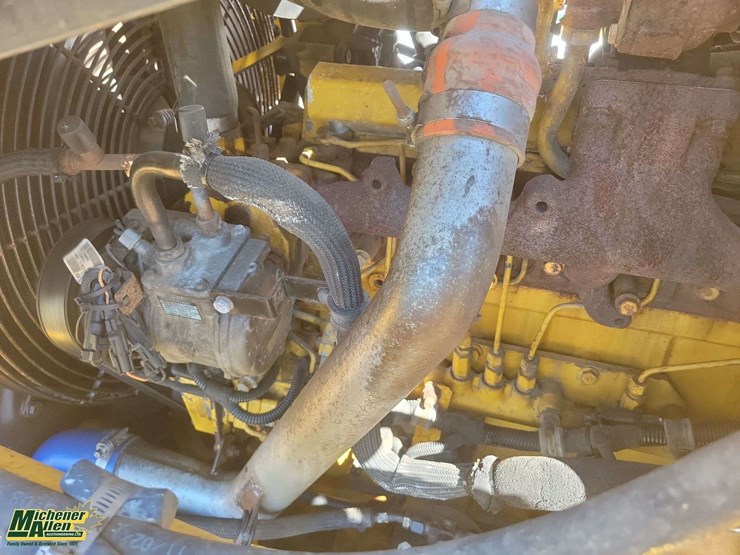 2011-deere-710j-image-28