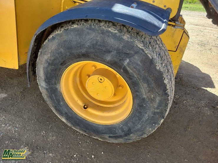 2011-deere-710j-image-31