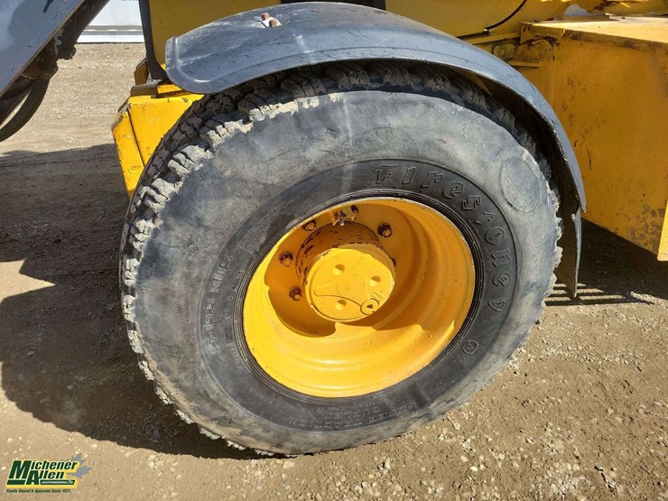 2011-deere-710j-image-29