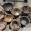 large-group-of-cast-iron-pots-and-cauldrons-image-3